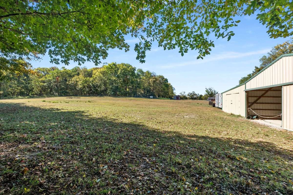 Over 1.5 acres of fenced pasture adjacent to the house and yard