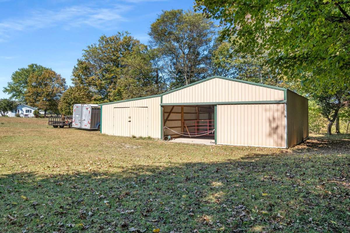 Barn with 3 horse stalls, power, water and equipment storage