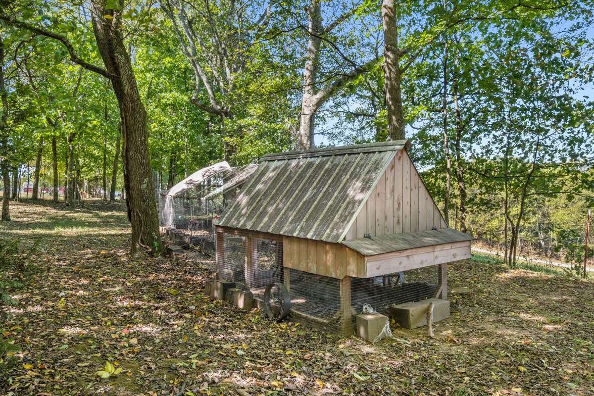 Chicken coop is accessible but out of the way