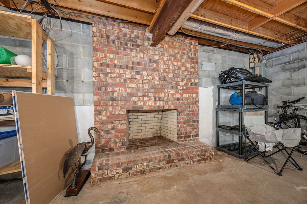 Second woodburning fireplace in basement