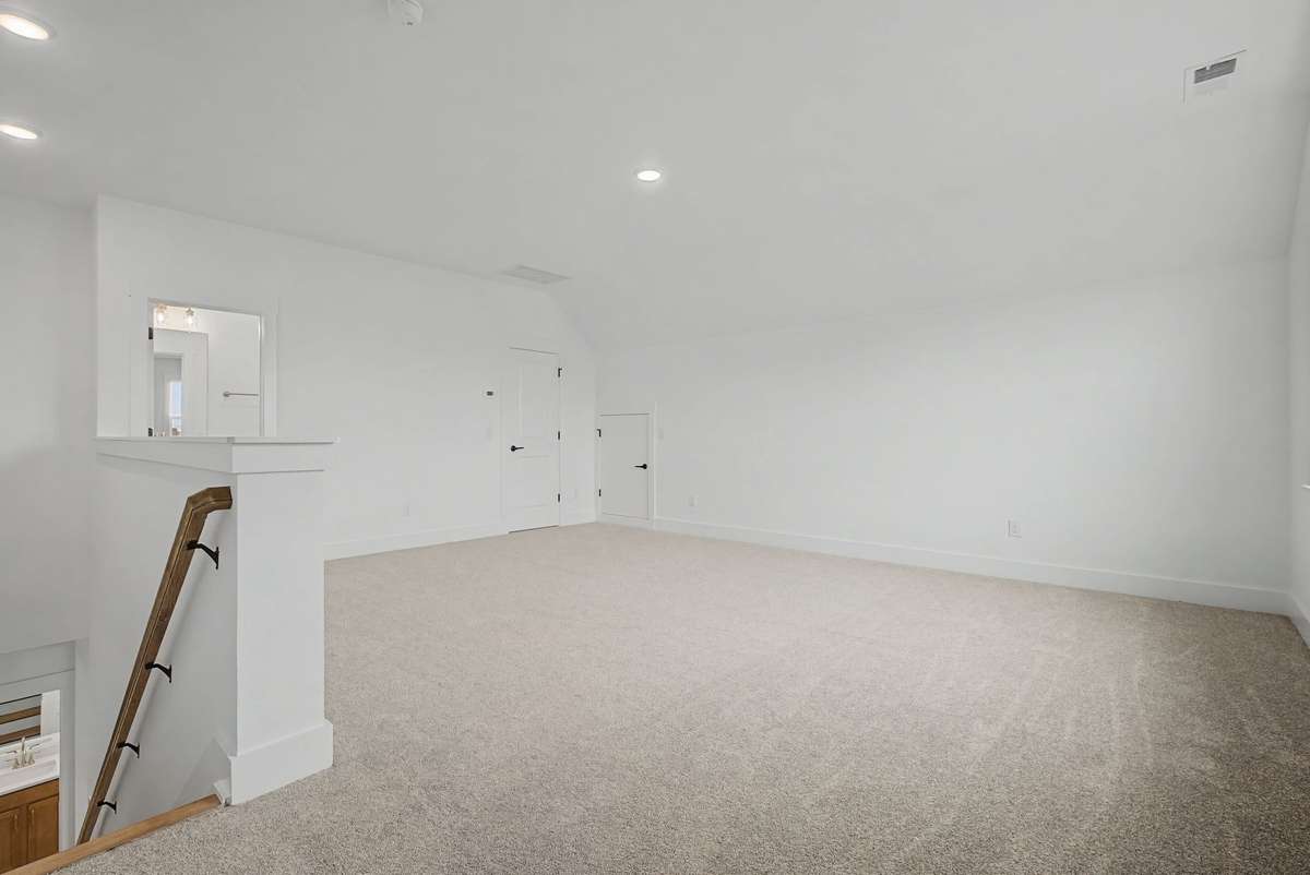 HUGE bonus room with full bath and large storage closet.