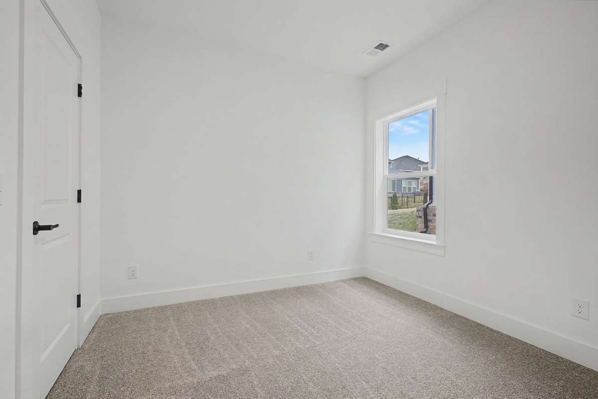 Secondary bedroom on main floor.