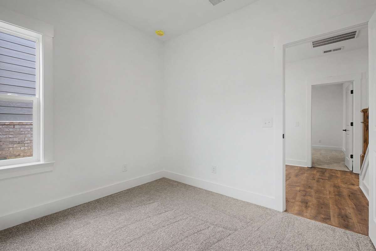 Secondary bedroom on main floor.