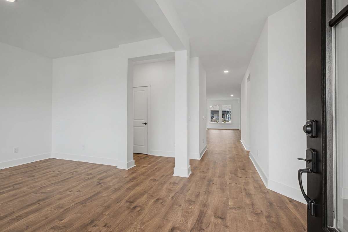 Inviting foyer with open study.