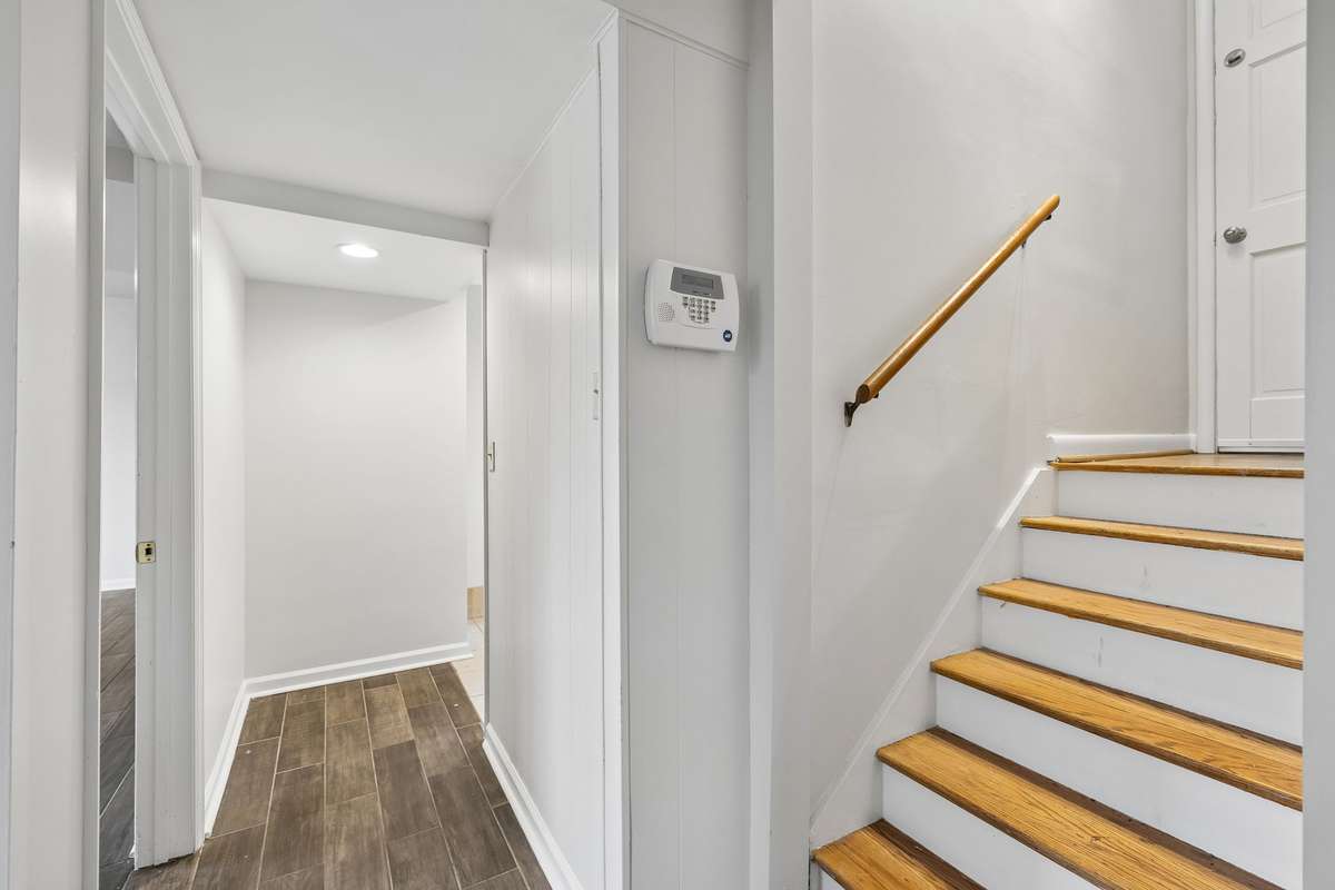 To the left is 1 bedroom, 1 bathroom and the laundry room.