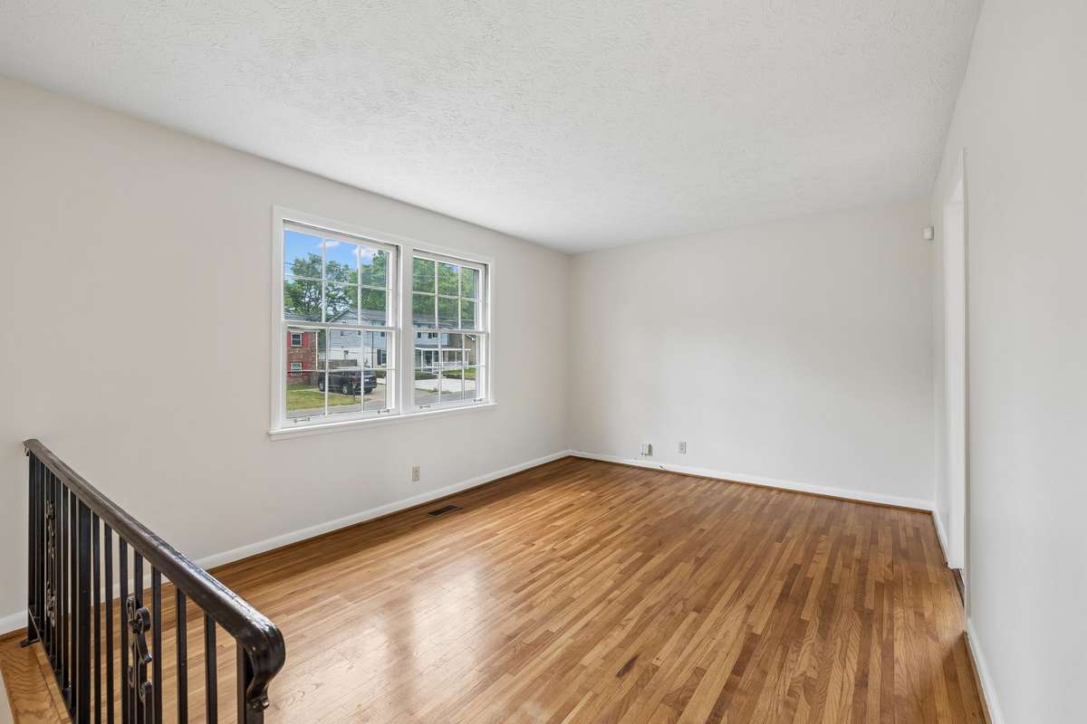 Upstairs you'll find a spacious living room.