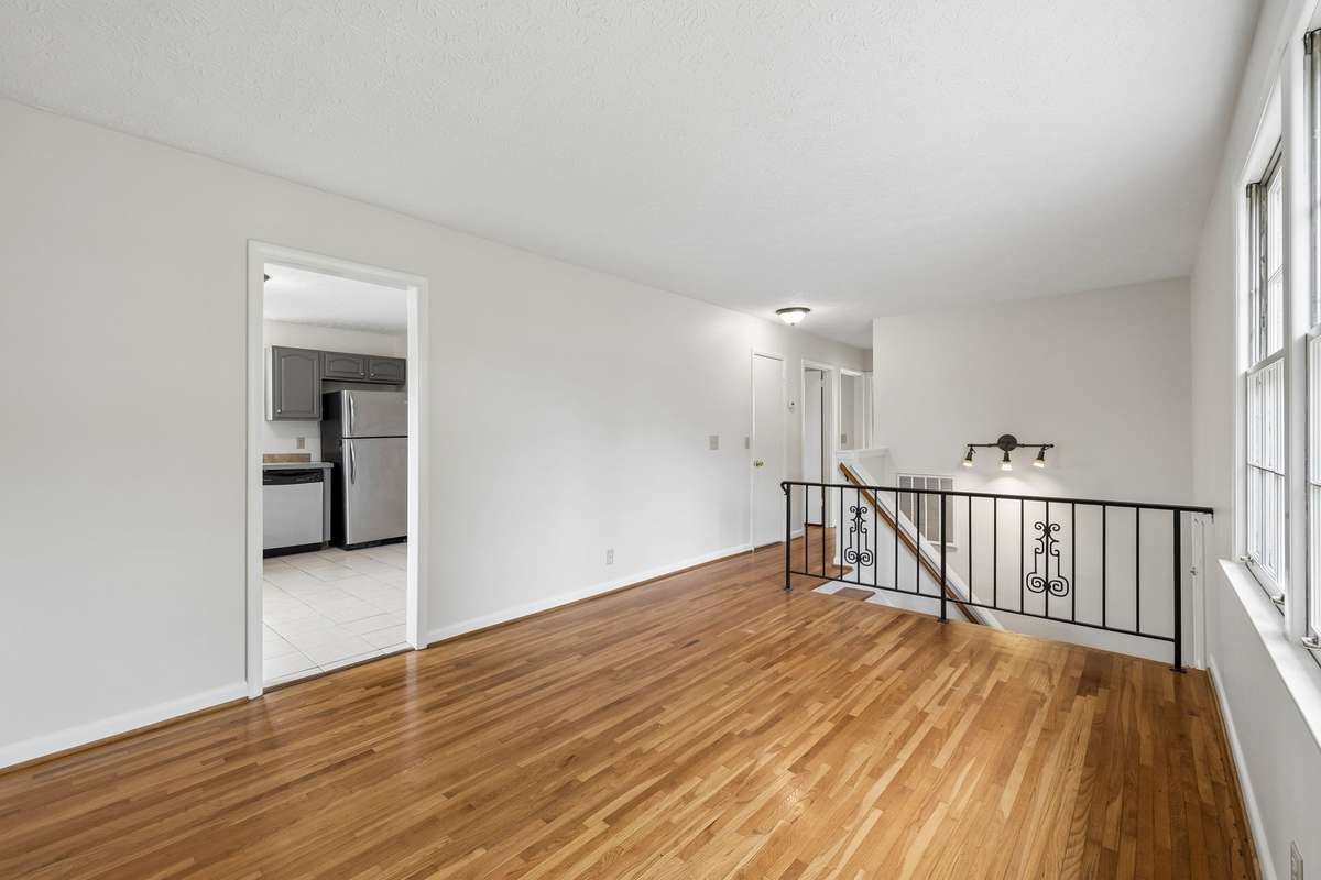 Through the living room you'll see the eat-in kitchen.