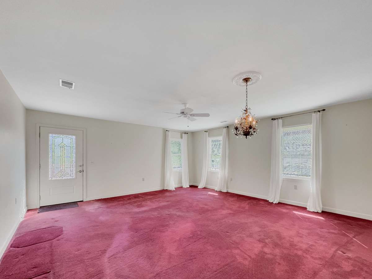 Living room with a lot of natural light and access to the deck