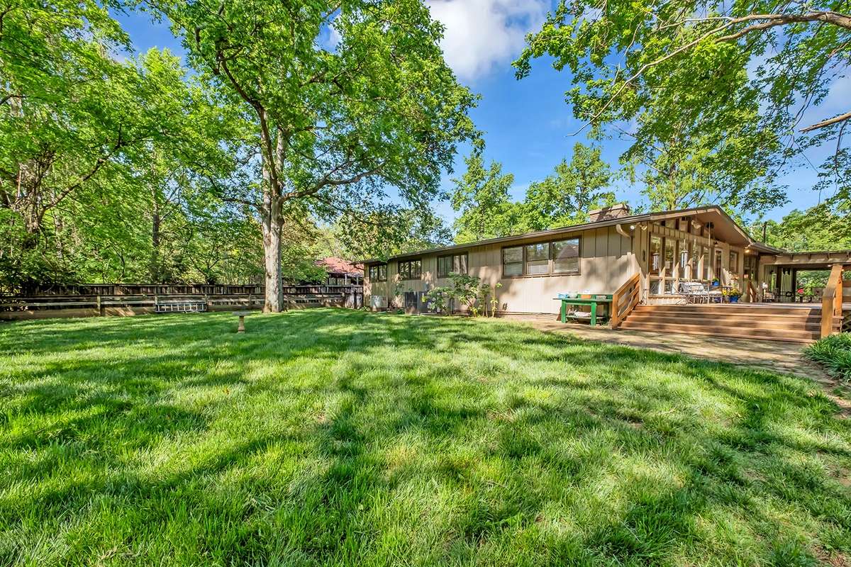 Large fenced + gated back yard