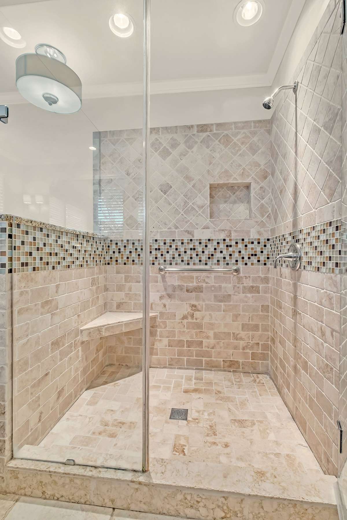 Tile + glass shower w/built-in seat