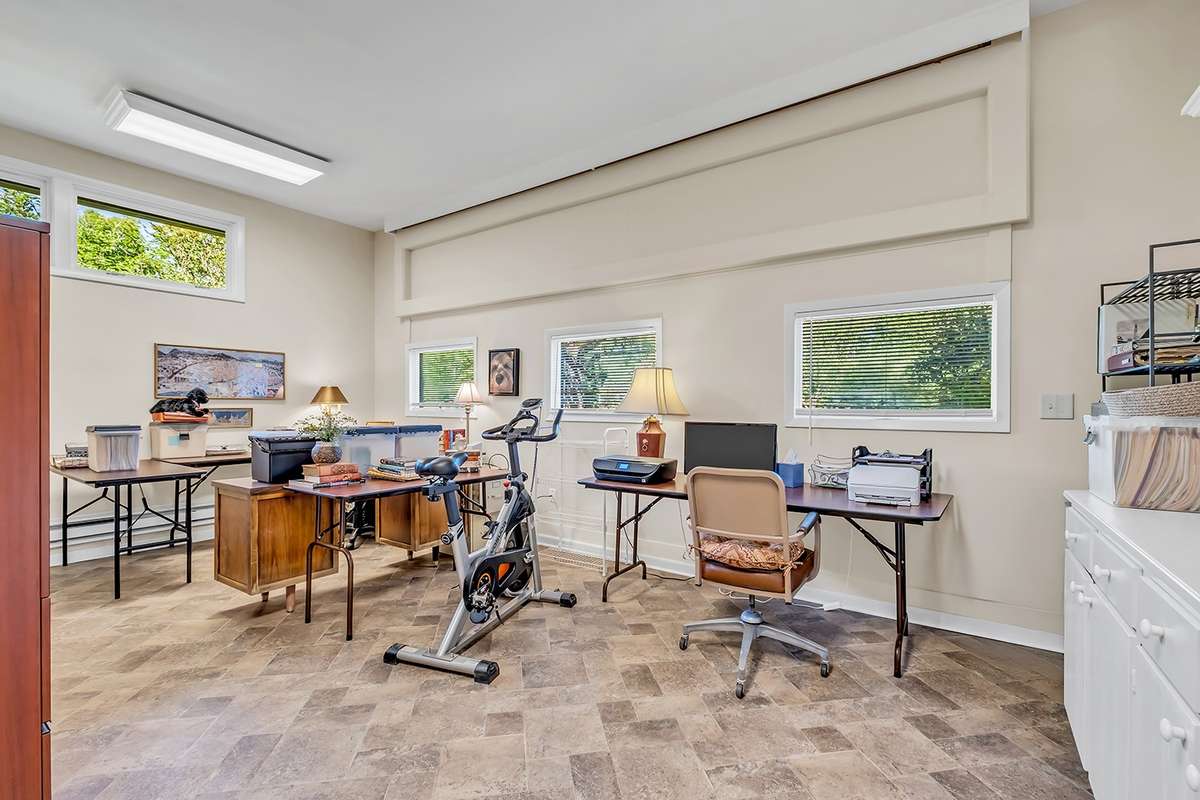 Converted garage currently houses office + workout space