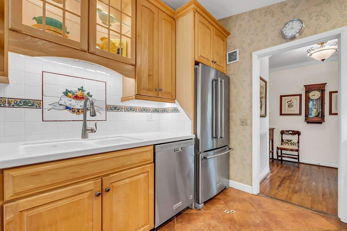 Custom Italian tile backsplash + under cabinet lighting