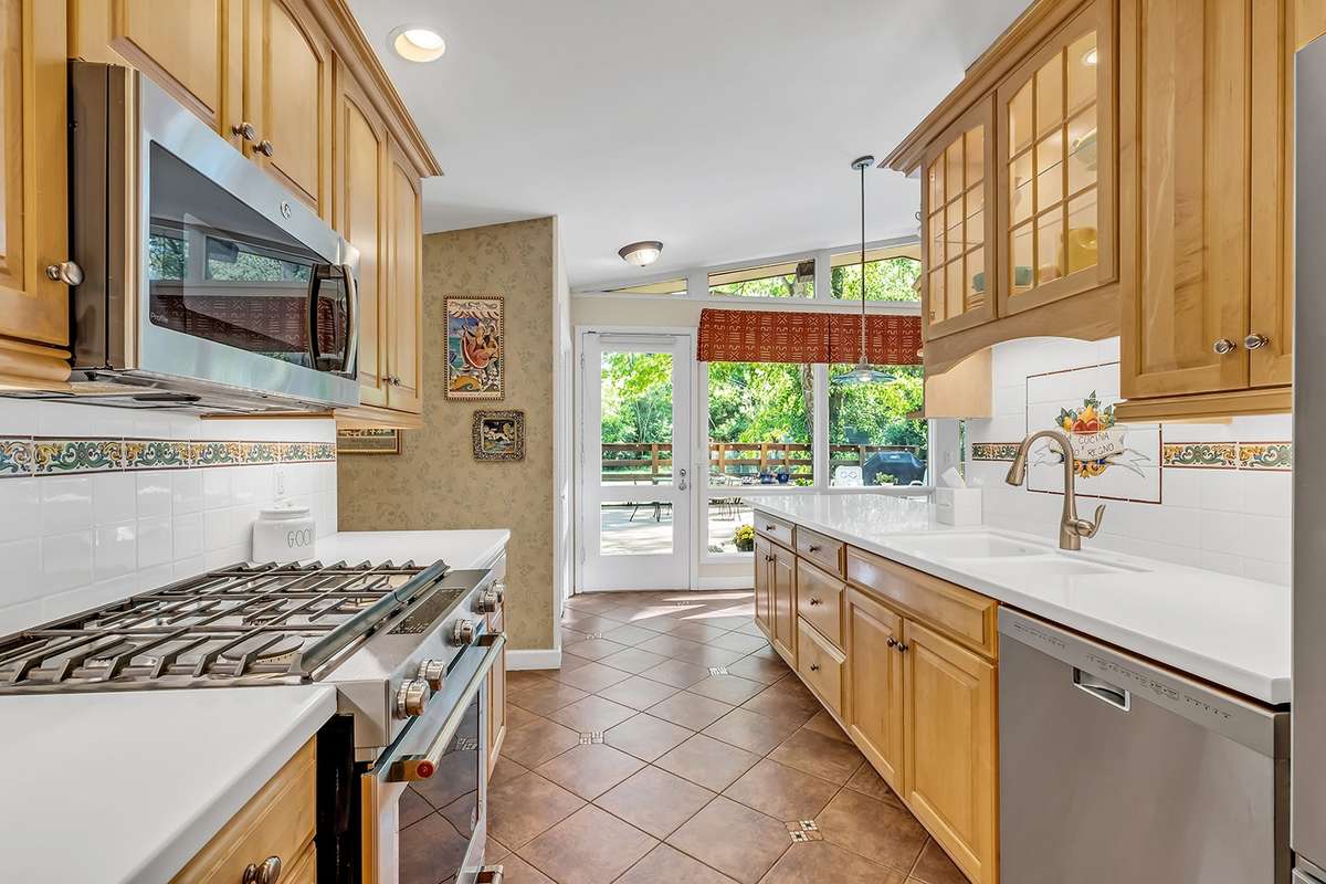 Lighted cabinets + custom lighting throughout