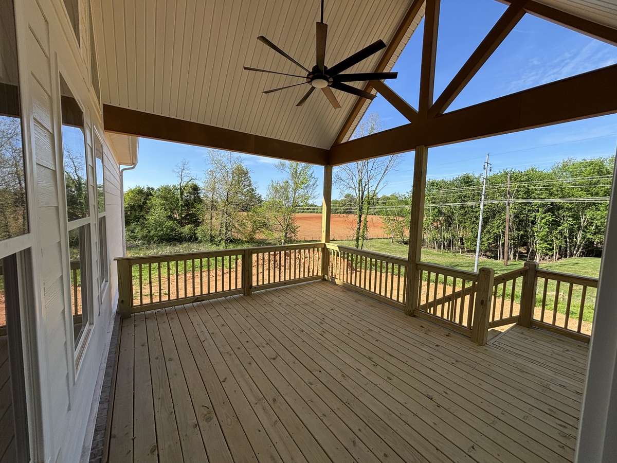 covered deck with vaulted ceiling