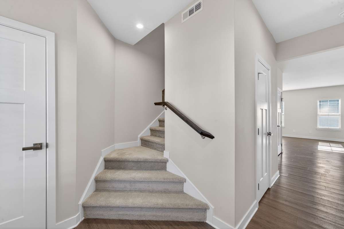 Stairs to 2nd floor w new carpet