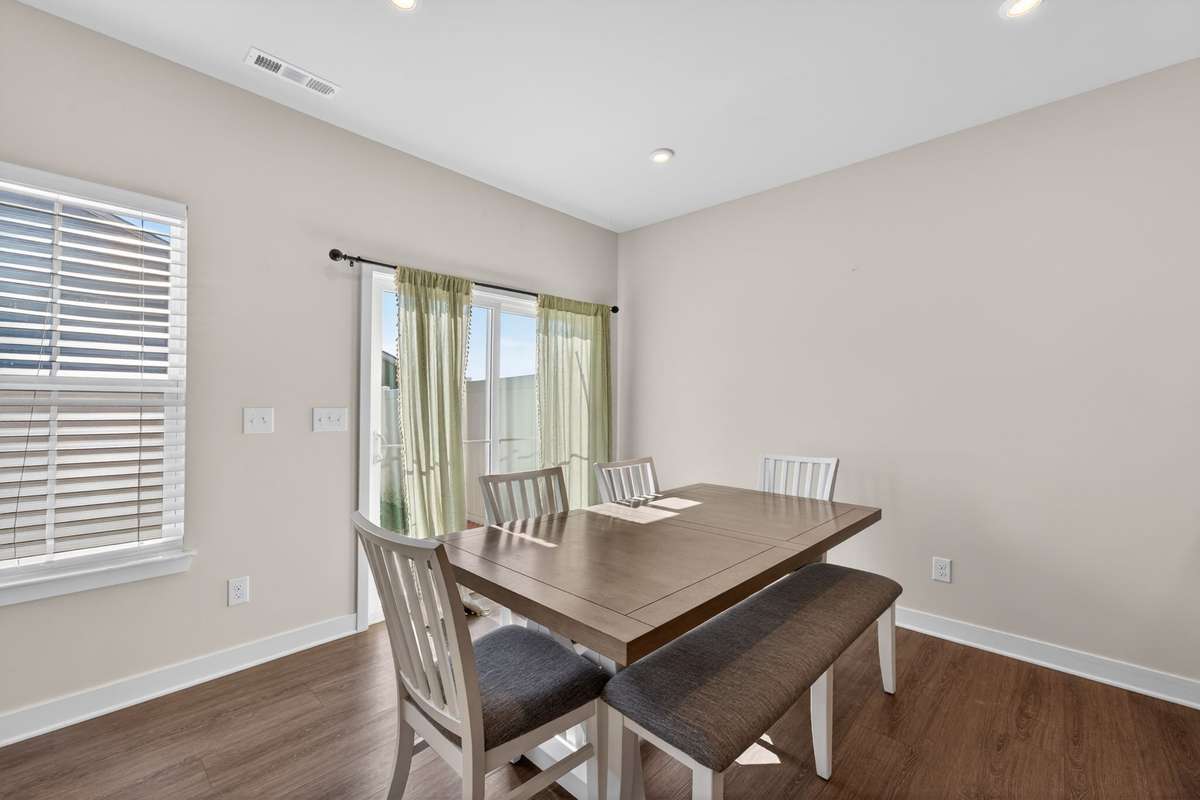Dining area with entrance to back yard