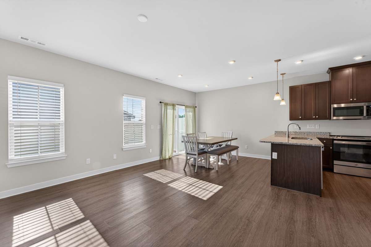 Open concept living, dining and kitchen