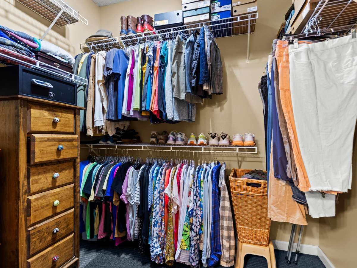 Primary Bathroom- wood flooring, two walk in closets