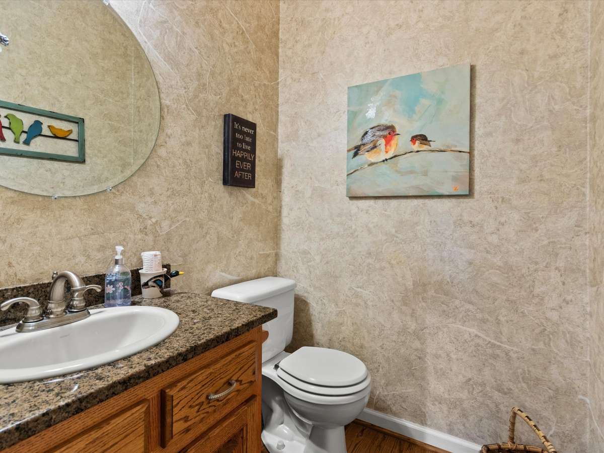 Guest Bath- Wood flooring, granite countertops