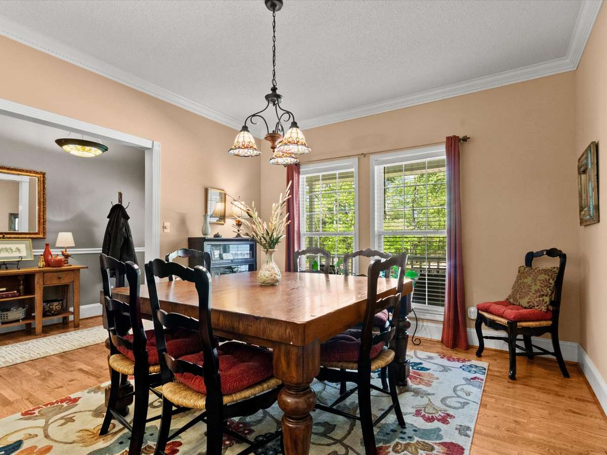 Dining Room- Wood flooring, crown molding, 9' ceiling