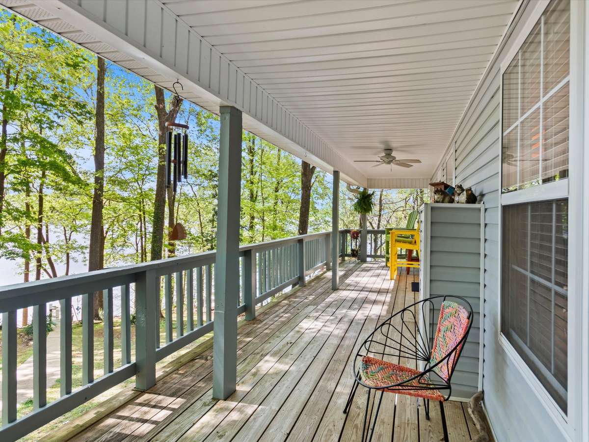 Deck- Covered deck with ceiling fan and great views of the river