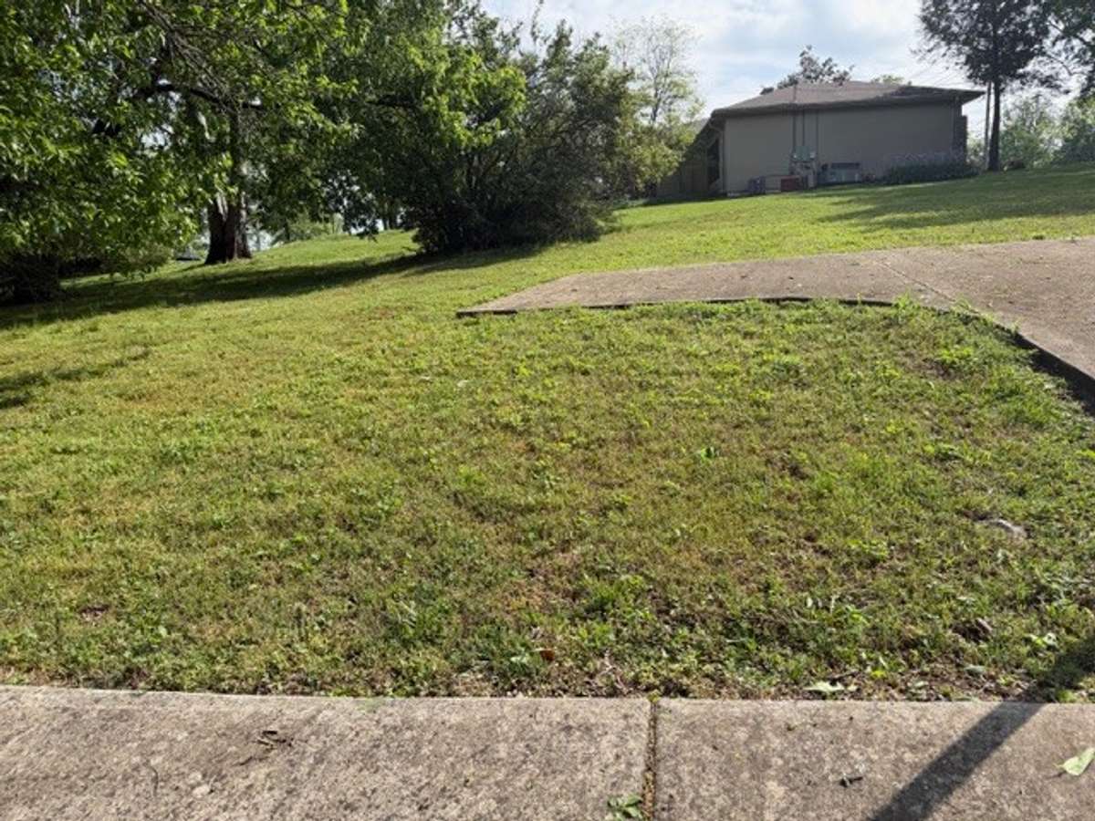extra drive way leads to second entrance of property (drive way has permission to be extended to main back st.