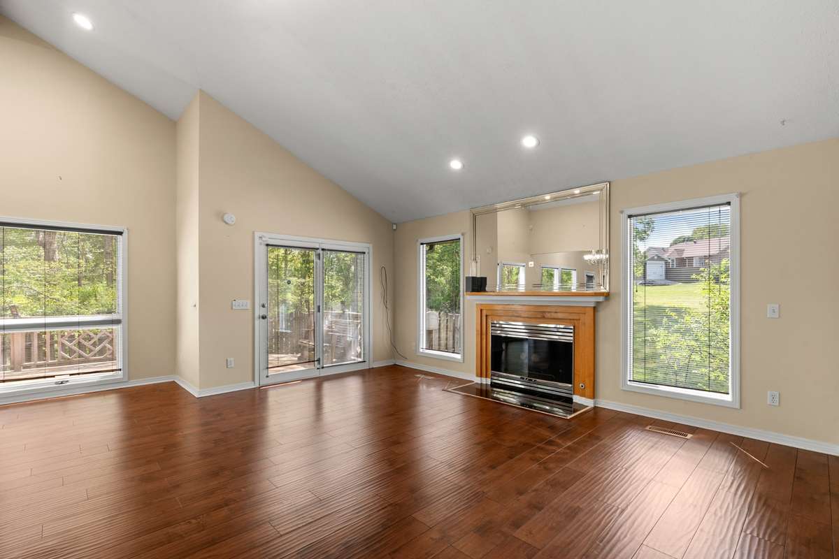 Living room / den is 15 x 17. Ceiling height at the highest point is 14'.
