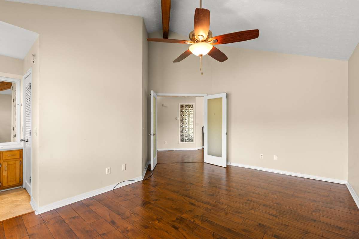 Double doors goes back out to Den, door on left is to Master Bathroom.