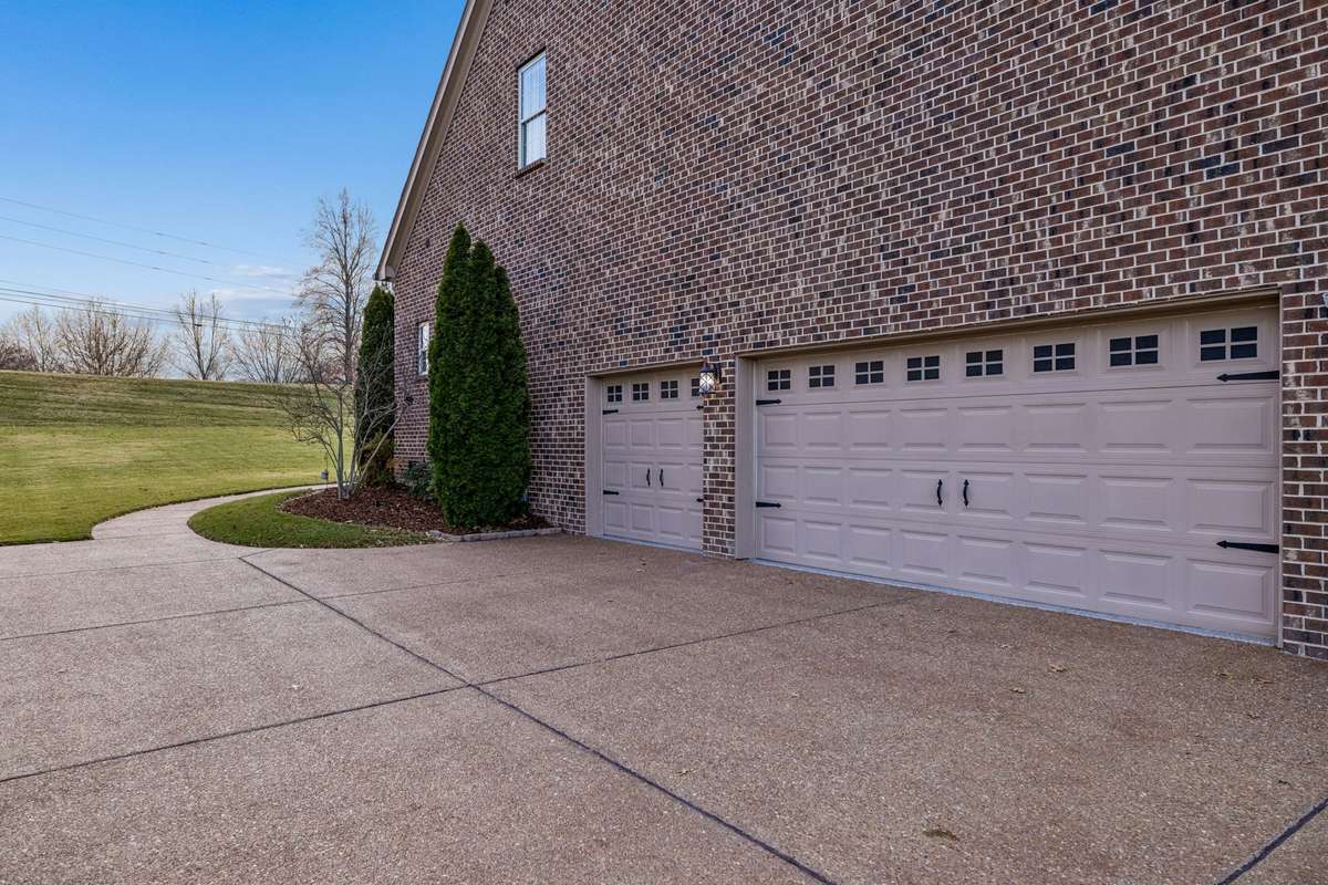 3 car garage with new epoxy floors