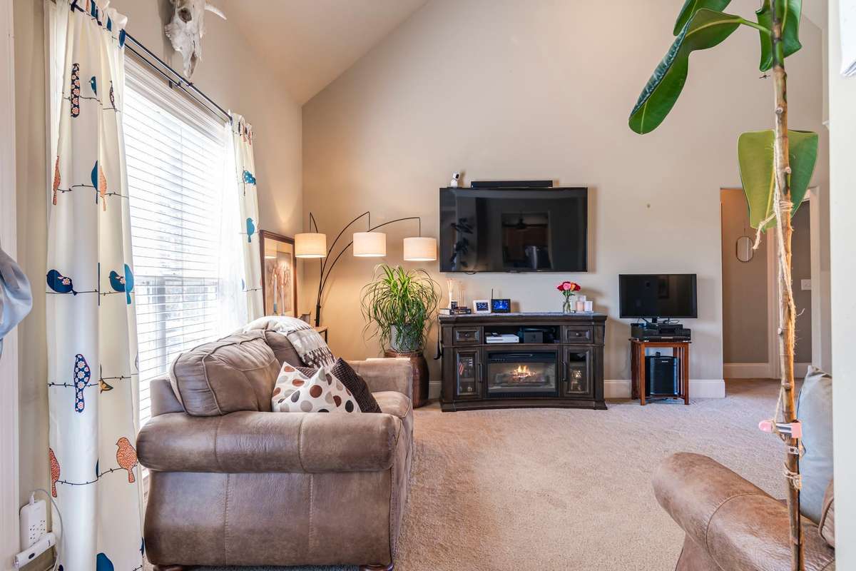 Abundant natural light from large floor to ceiling windows.