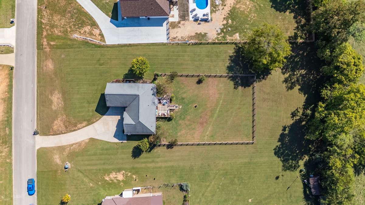 Property extends beyond fence.