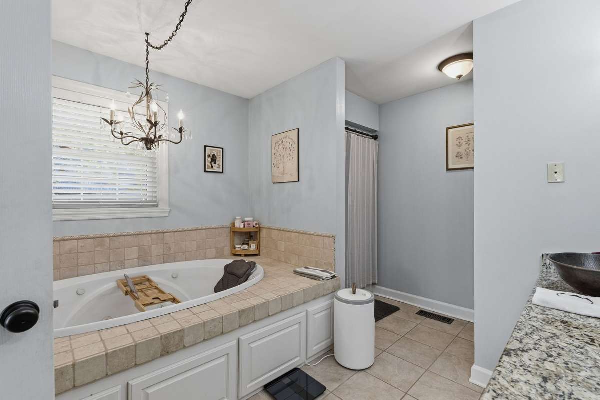 AND HERE'S THE PRIVATE OR MASTER BATH - THE SOAKING TUB IS MAGNIFICENT!!