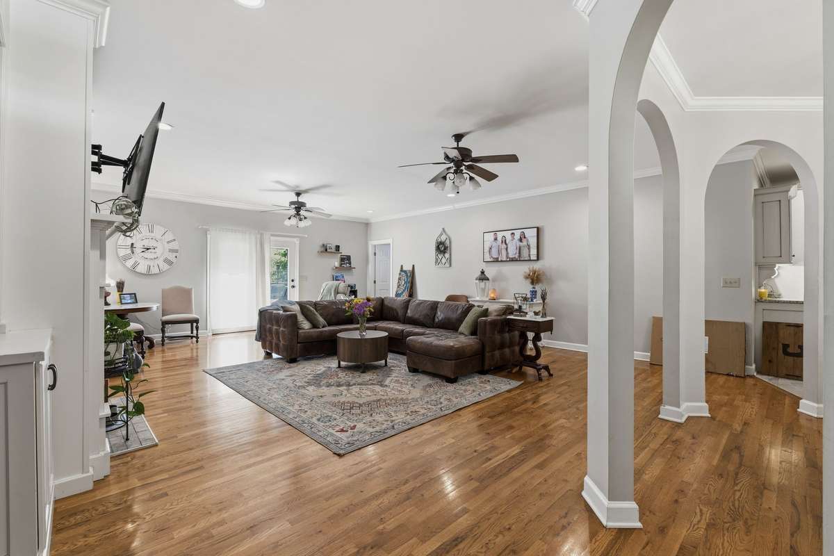 WELCOME HOME!! YOU WALK INTO A BREATH-TAKING GREAT ROOM!!  HUGE AND WITH GORGEOUS WOOD FLOORS & FIREPLACE!!