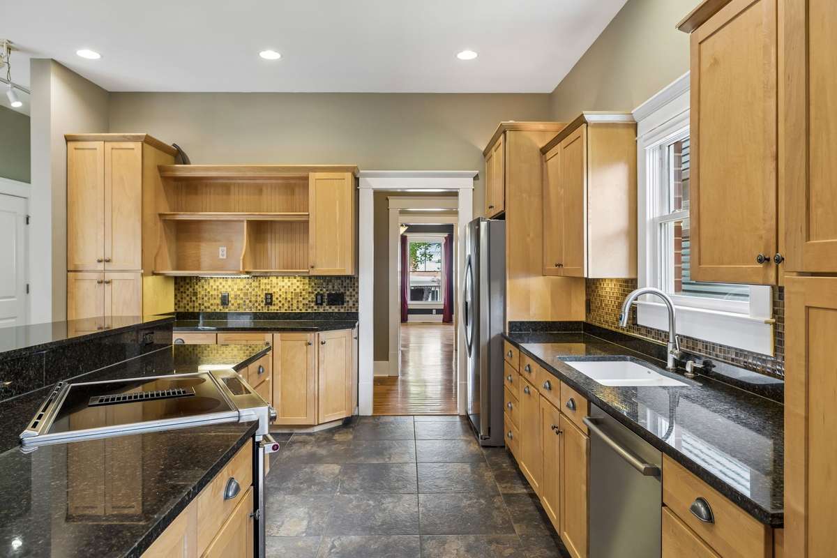Spacious kitchen featuring ample storage throughout
