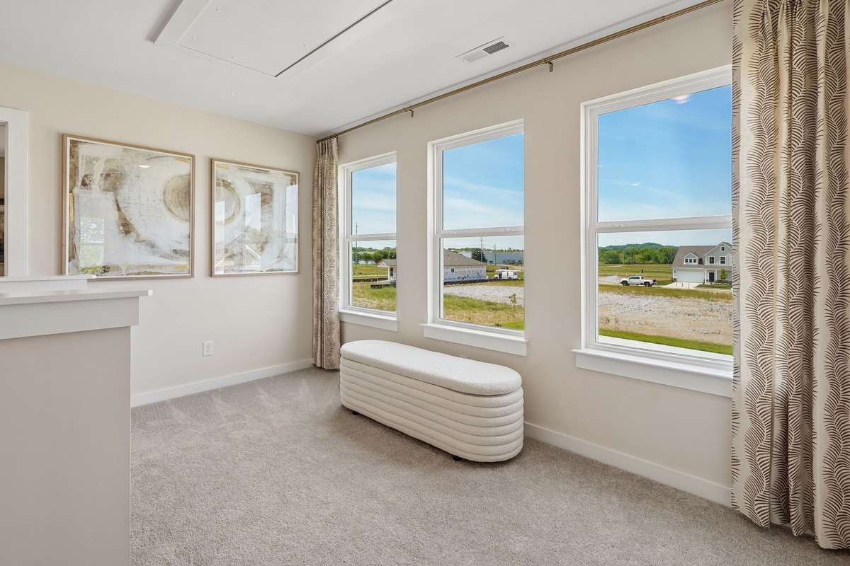 Upstairs hall.  Picture is from furnished model home in the community