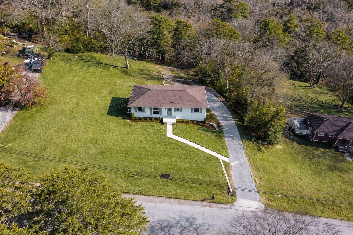 This home has so much to offer! 
(**picture was ai enhanced to show the way the zoysia grass will look**)