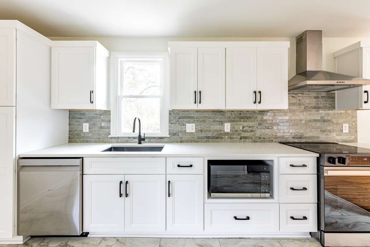 Non ai enhanced photo of the kitchen. It has all new everything.