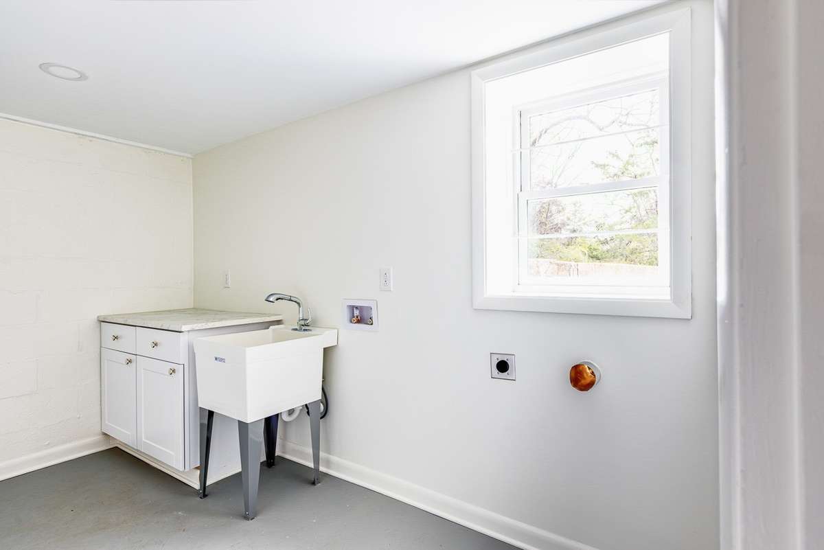 Non ai enhanced photo of the laundry room that was created.