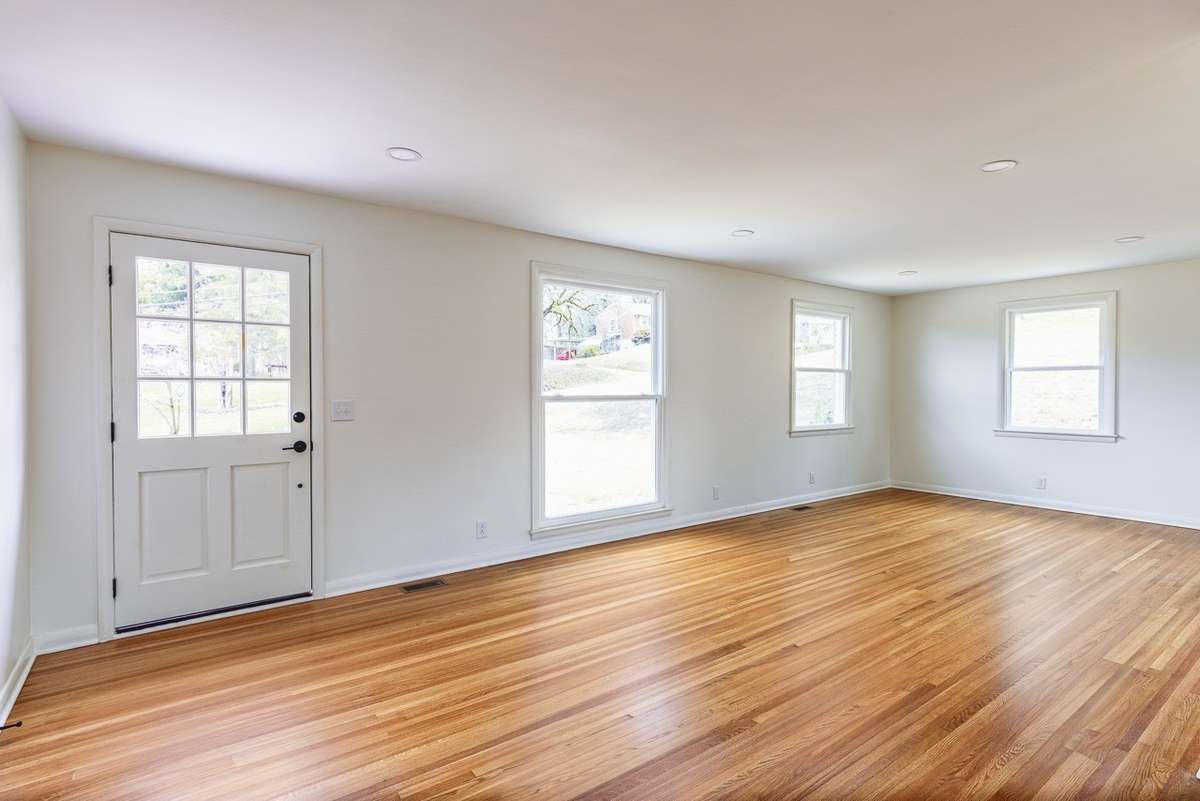 This non ai enhanced photo of the living space. It is huge and can be set up in many ways.