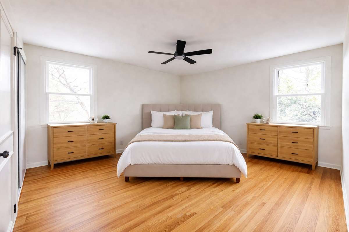 The primary suite has great natural light through the all new windows. This shows one way the room could be set up.
(**picture was ai enhanced to show the way the home could be lived in/decorated**)