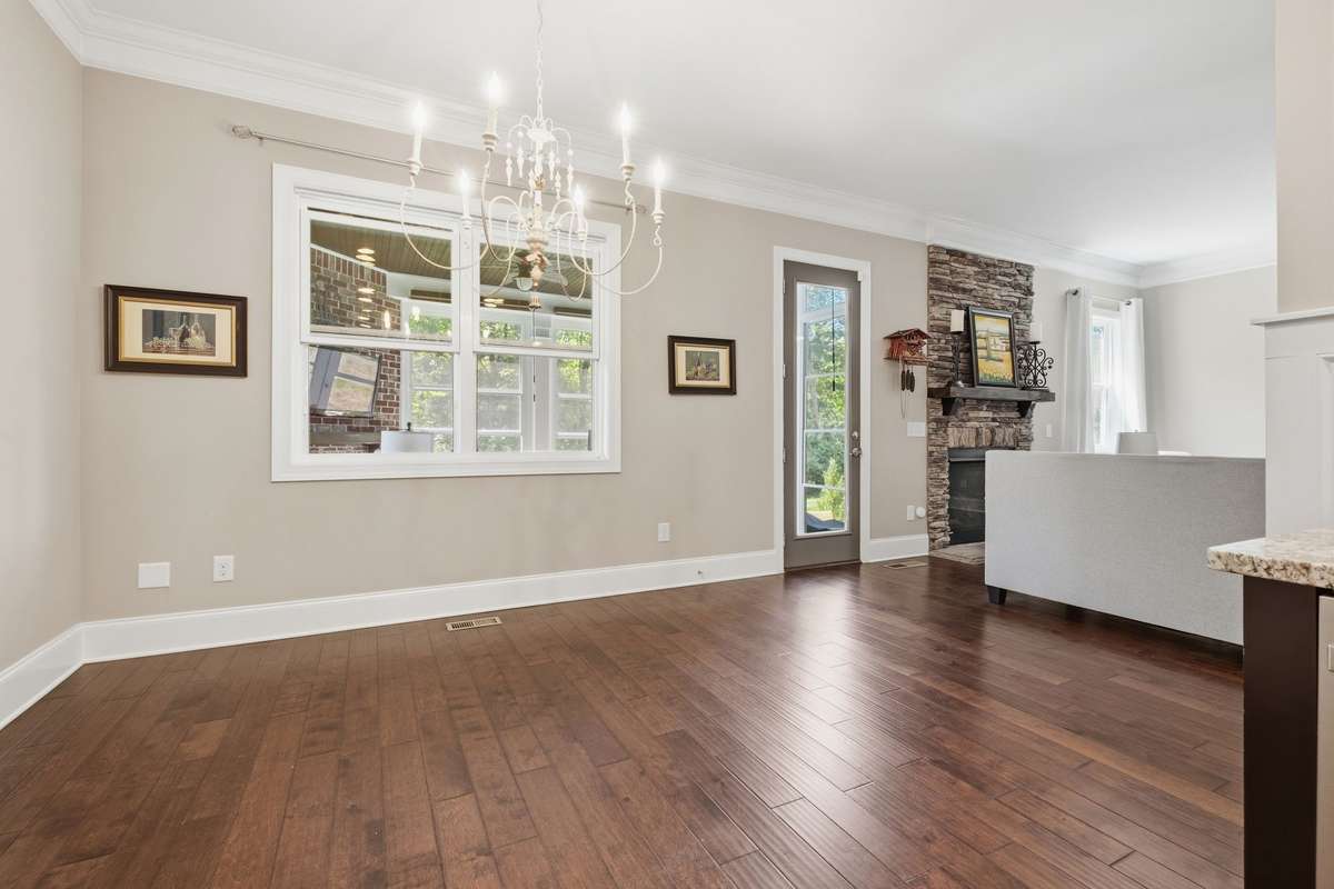 Large Breakfast room with pretty chandelier.