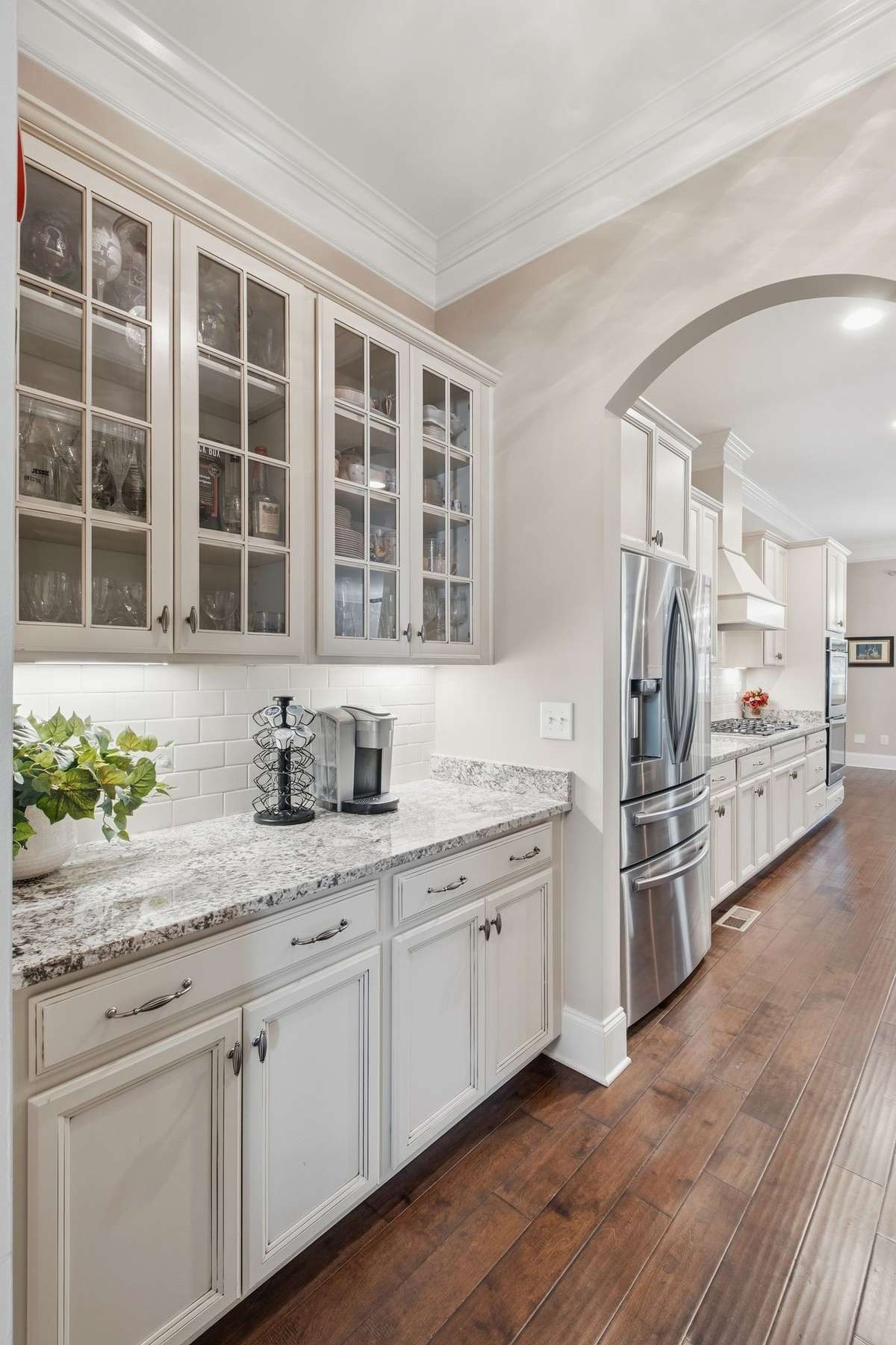 A Butlers Pantry connects the Dining Room to the Kitchen and is wonderful for all your entertaining needs.