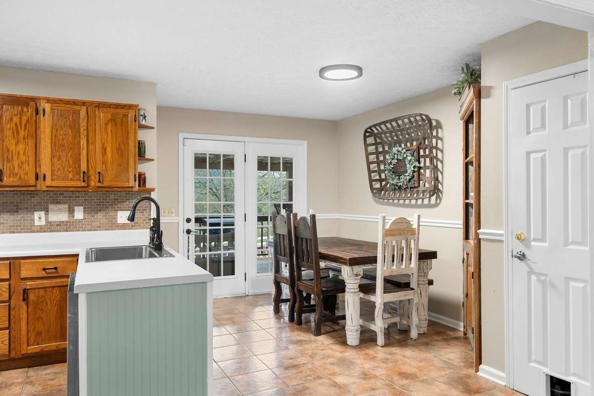 Dining area opens to the covered deck!
