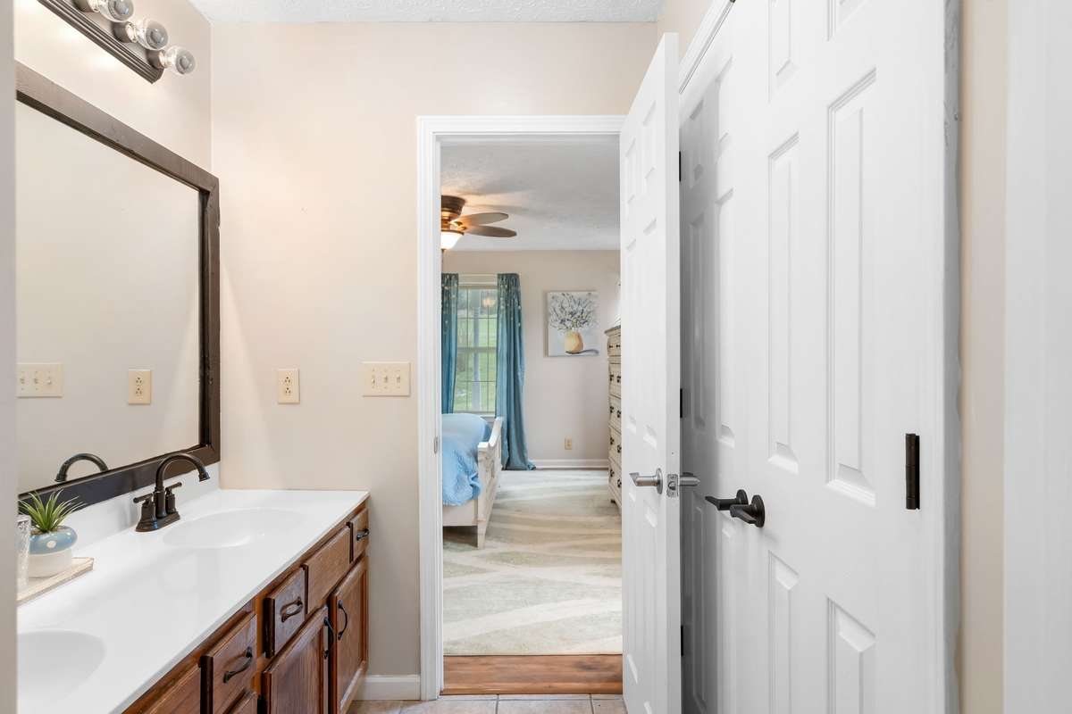 Dual sinks with generous countertop space.