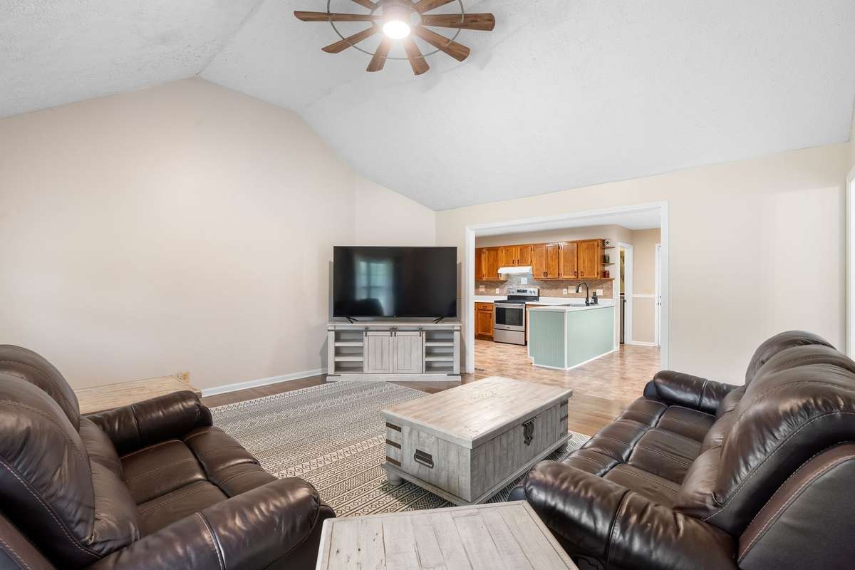 Connects to kitchen and dining area!