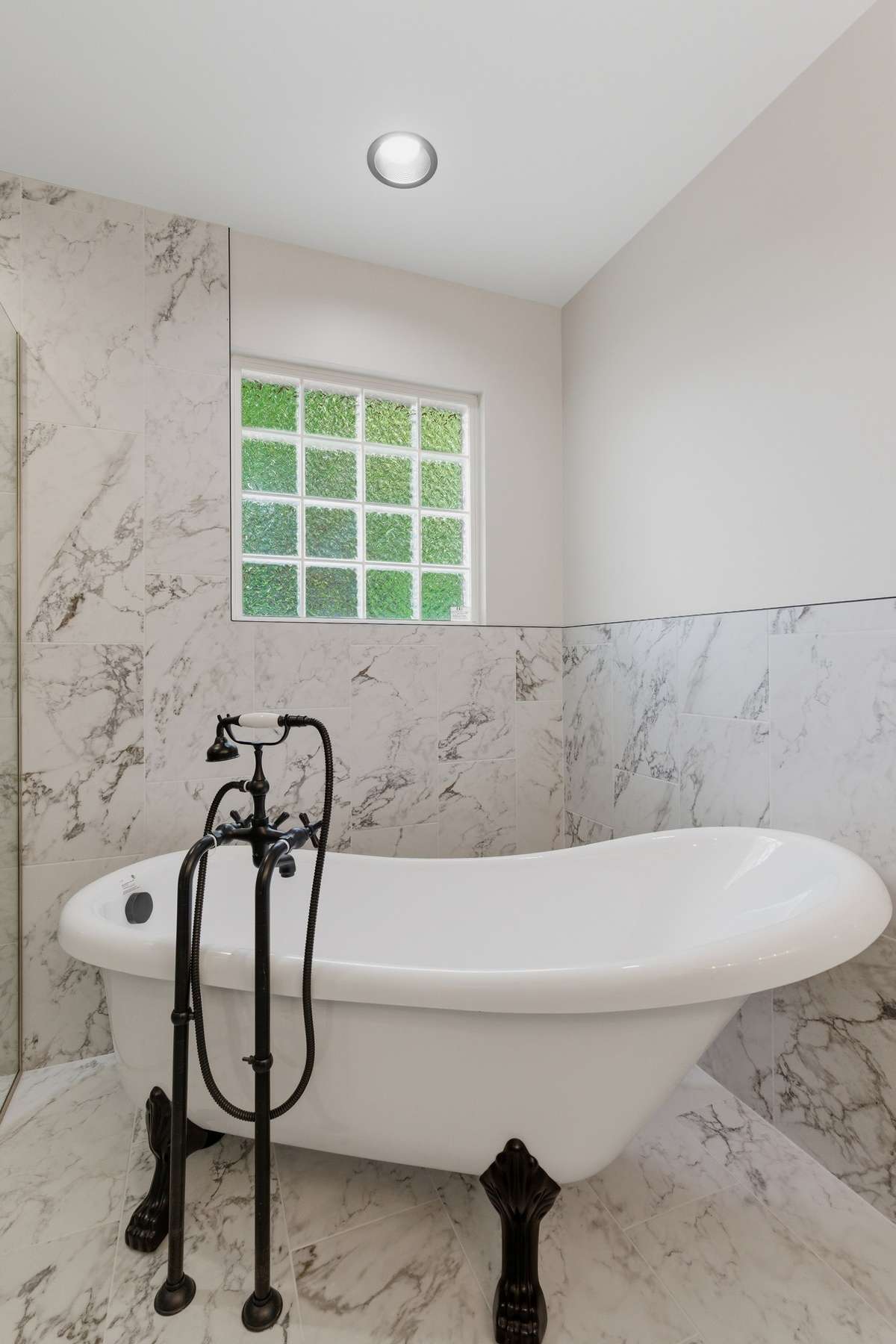 Clawfoot tub to enjoy after a long day