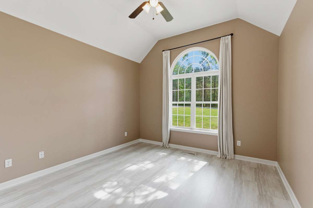 Guest Bedroom with beautiful window to enjoy the views