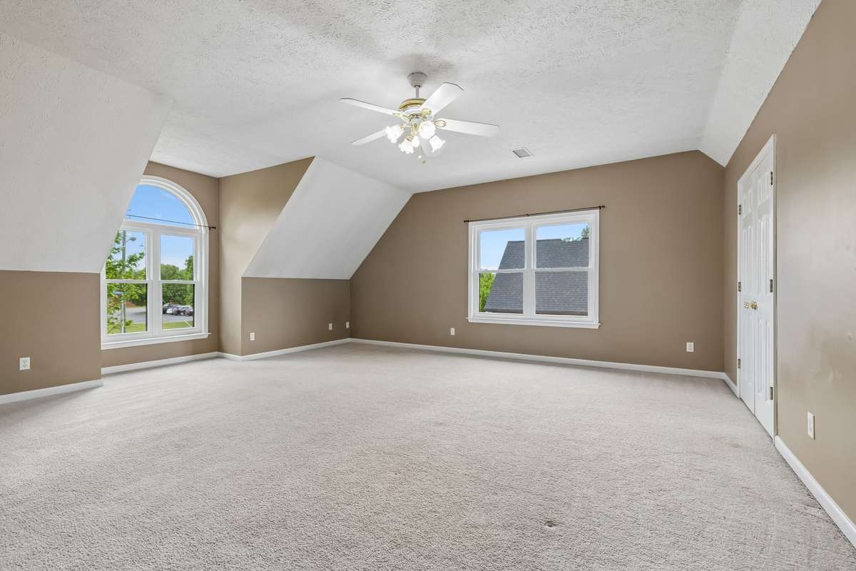 Another highlight is the large Bonus/Media room on the second level. With the closet and access to attic storage on the right, this could be a 4th Bedroom if needed!