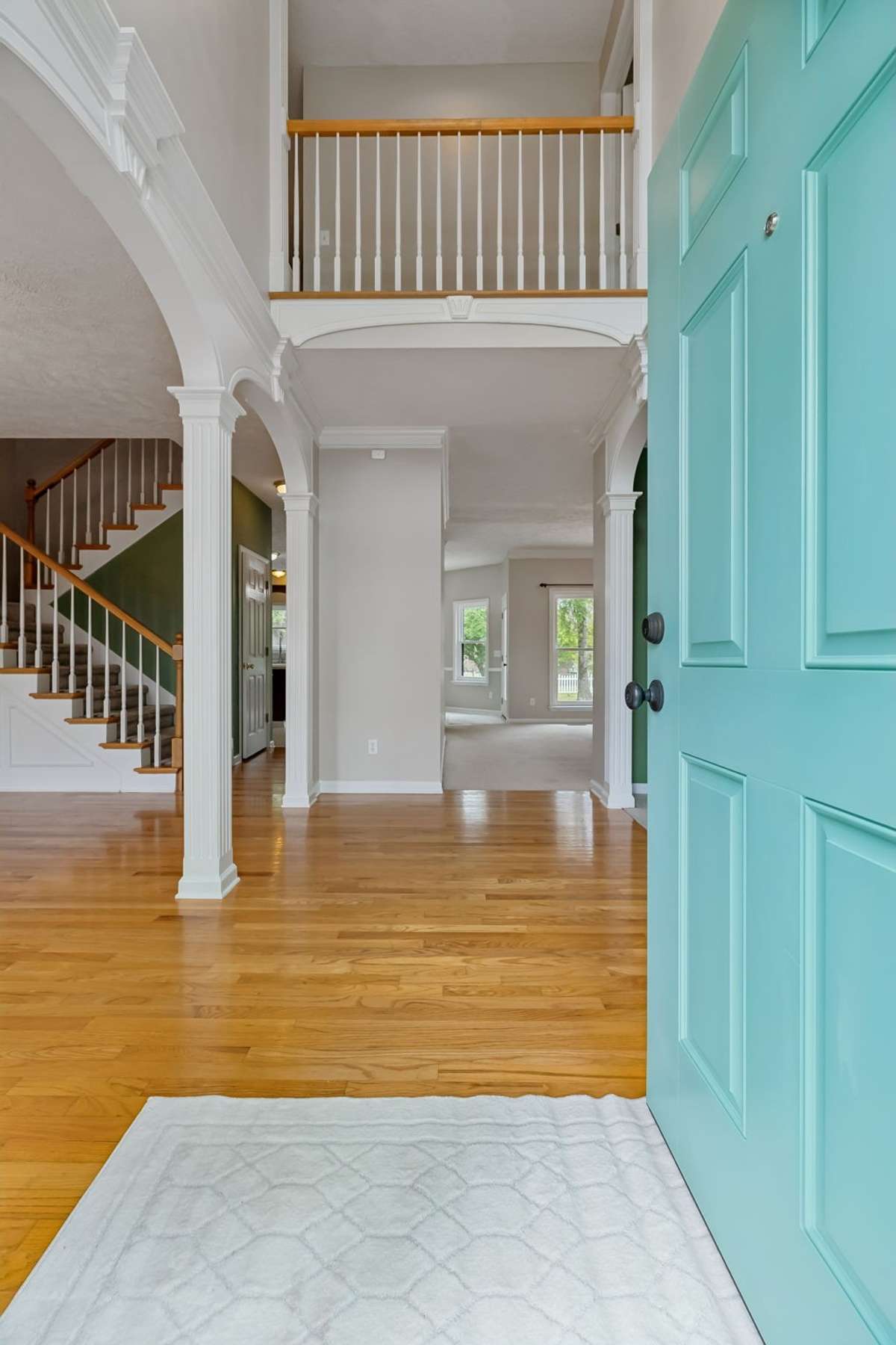 Enter through the new front door into a 2-story Foyer with walkway on the second level.