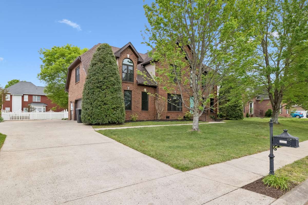 Let's start at the beginning and take a tour! The concrete drive leads to the 2-car garage with new garage door and pedestrian walk-through door! There's plenty of room to park up to 4 cars in the driveway!